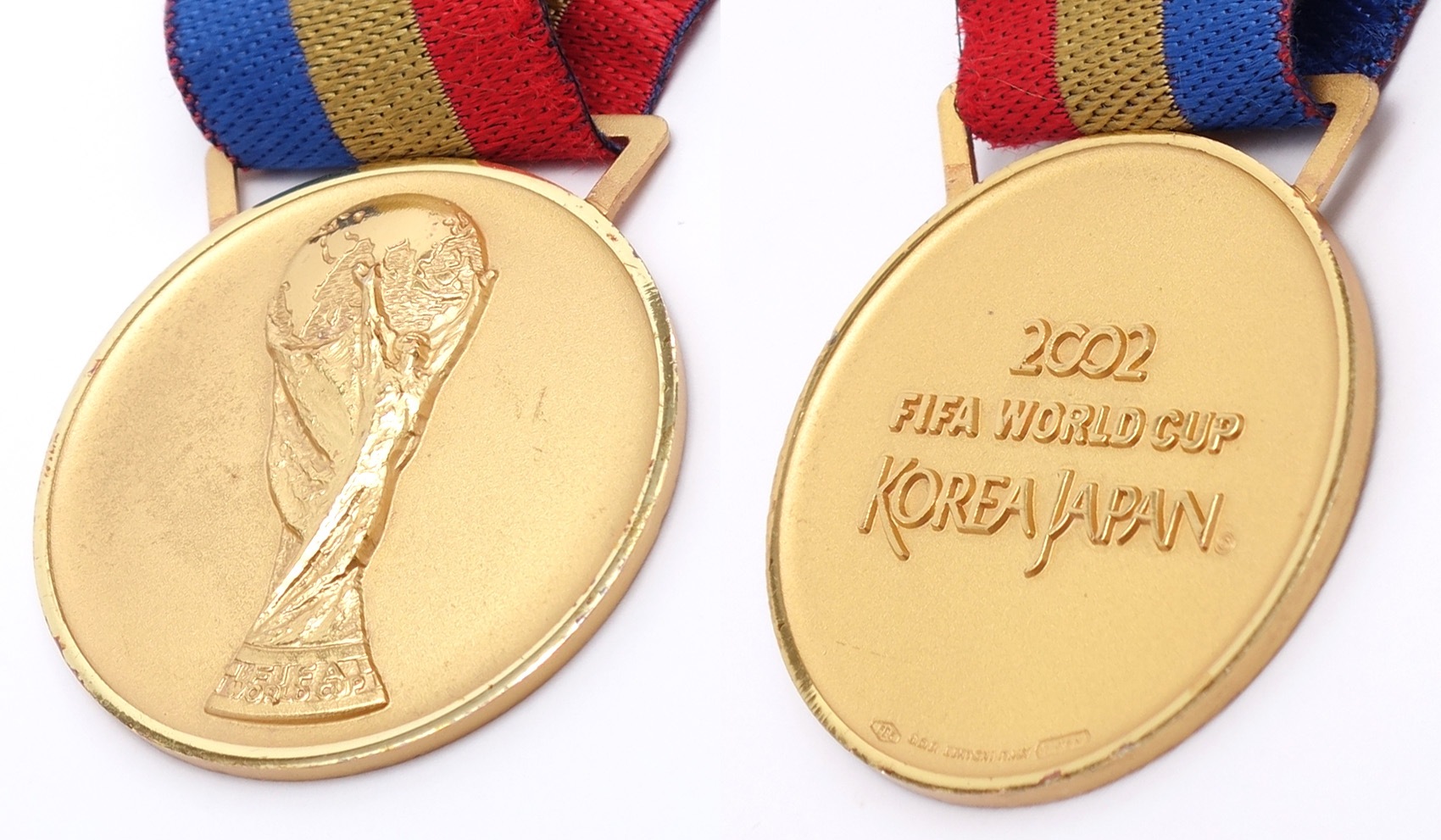 Front and rear view of 2002 FIFA World Cup Winner's Gold Medal
