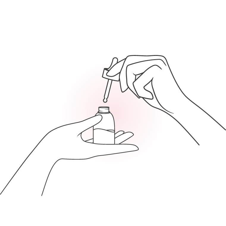 NUDE美容液を1滴手に取る