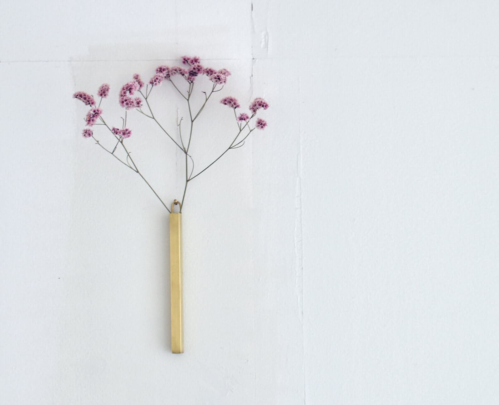 BRASS STICK WALL VASE