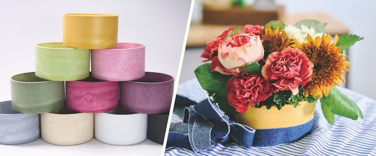 黄色のリサイクルプラポットにフラワーアレンジメント