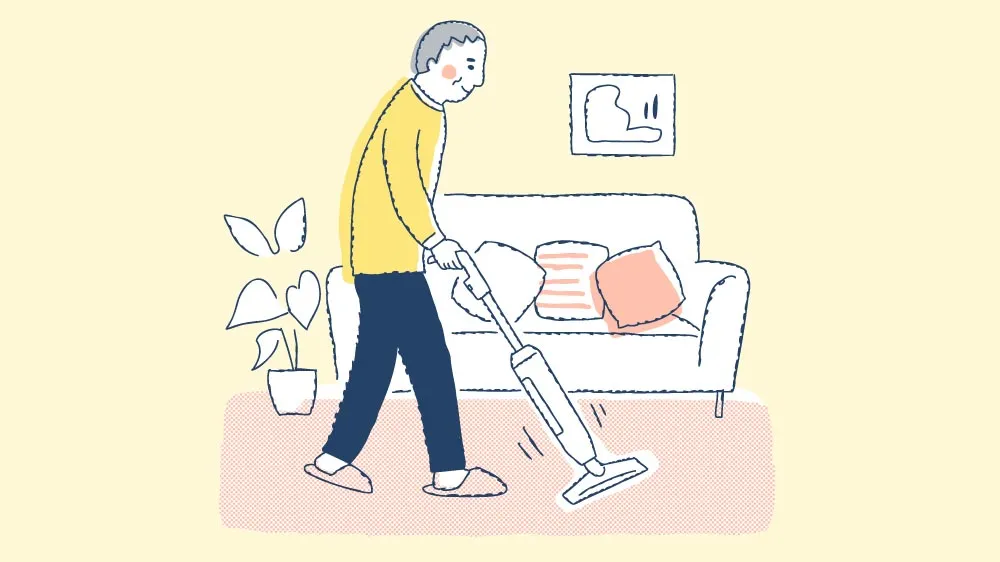 掃除機をかけている男性のイラスト