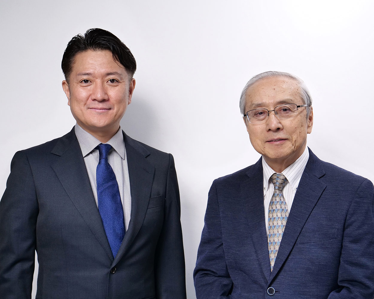 専務取締役 松永 昭司（左）／代表取締役 松永 彰（右）