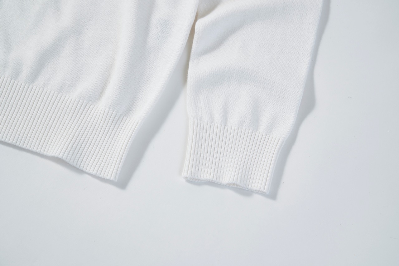 SEVE シルエットロゴ入り コットンゴルフセーター