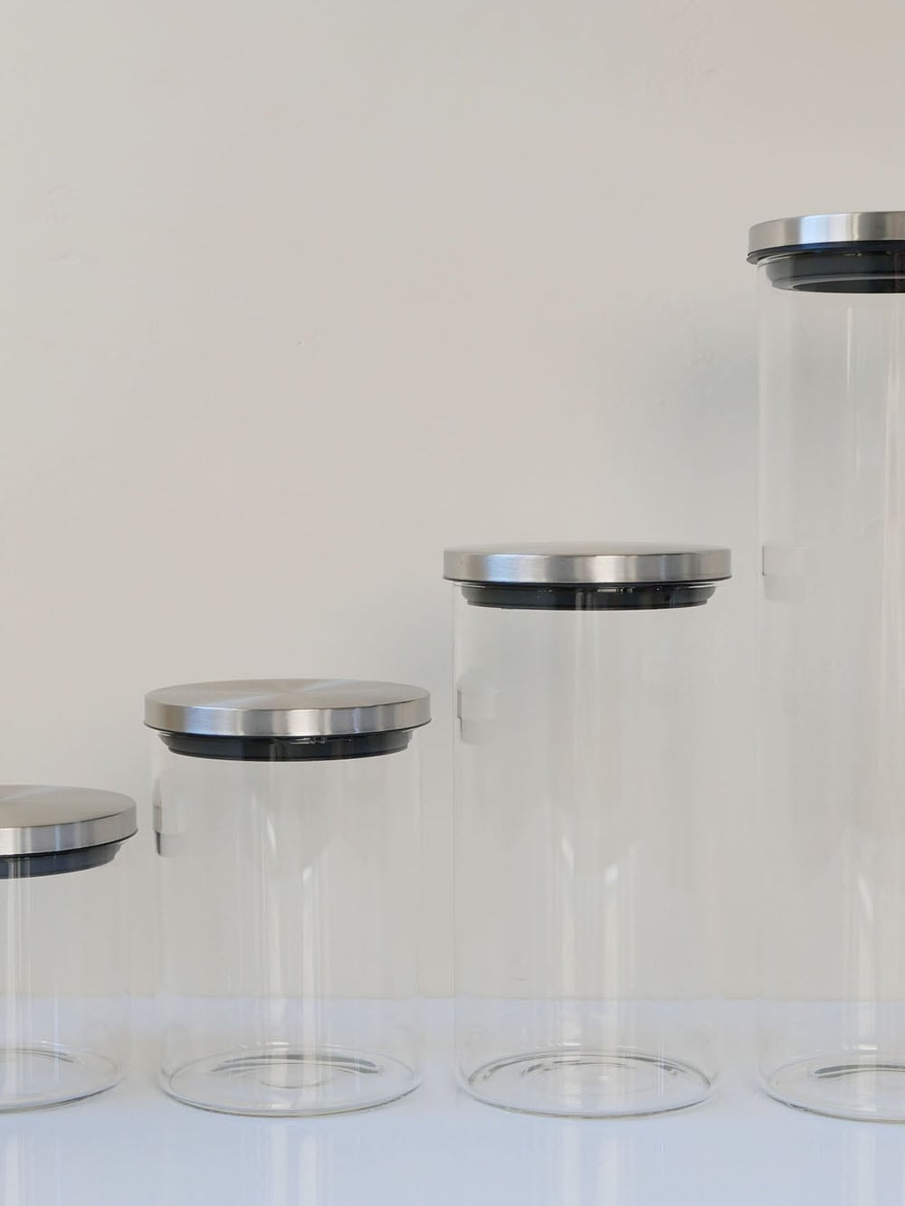 SALUSのスカンディックキャニスター、透明な耐熱ガラス製の円柱型フードコンテナとステンレス製蓋のセット