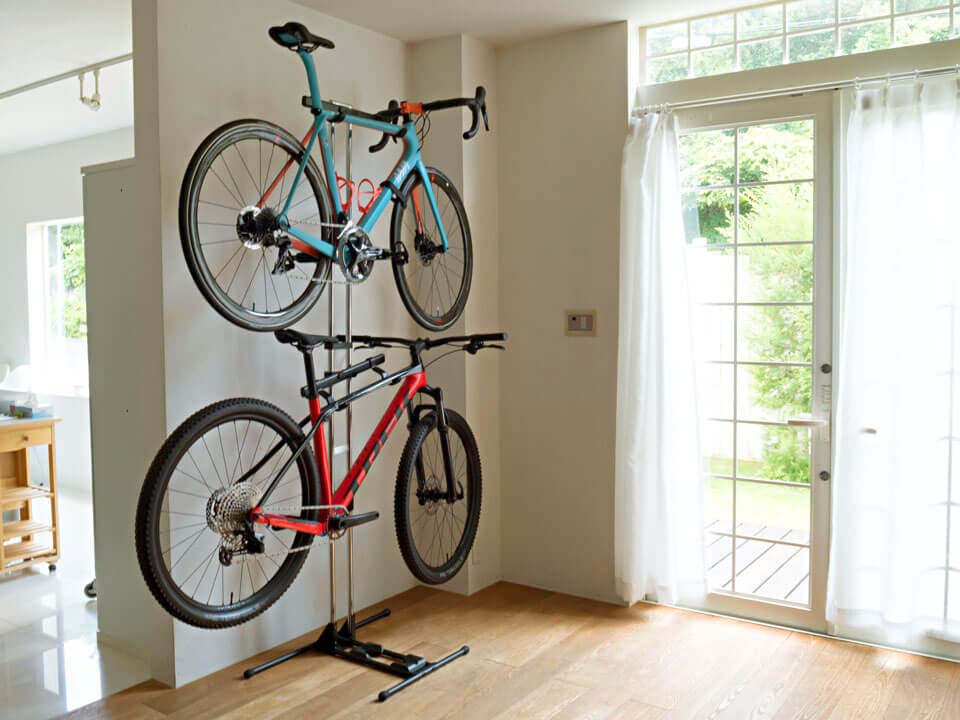 It saves space because the bikes can be stored upright.
