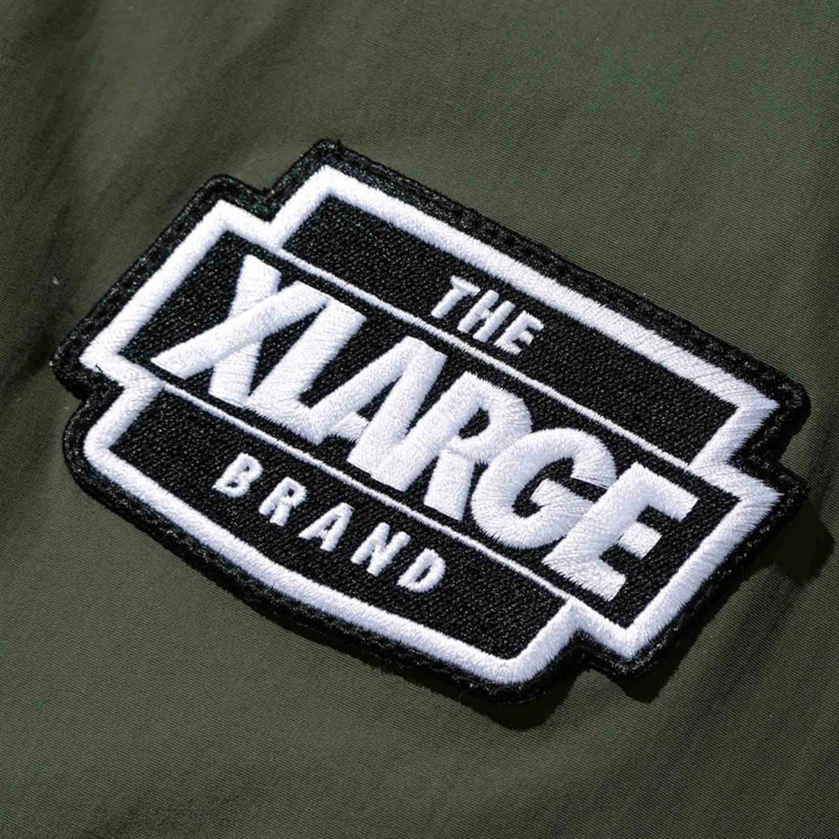 XLARGE エクストララージ ナイロンジャケット 刺繍ロゴ ワッペンロゴ-