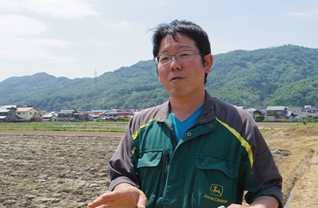 Photo of Satoshi Tanaka, CEO of Tanaka Farm Co., Ltd.