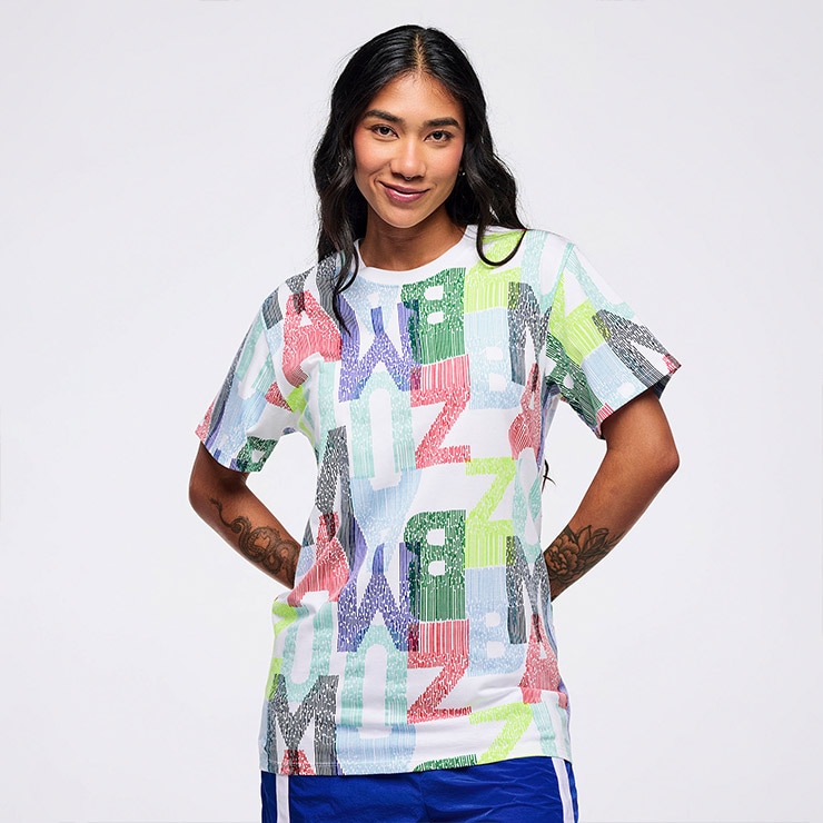 ZumbaIt 正規品シャツ S ZUMBA ズンバ 正規品 ウェア ユニセックス Tシャツ 半袖 総柄 ロゴ