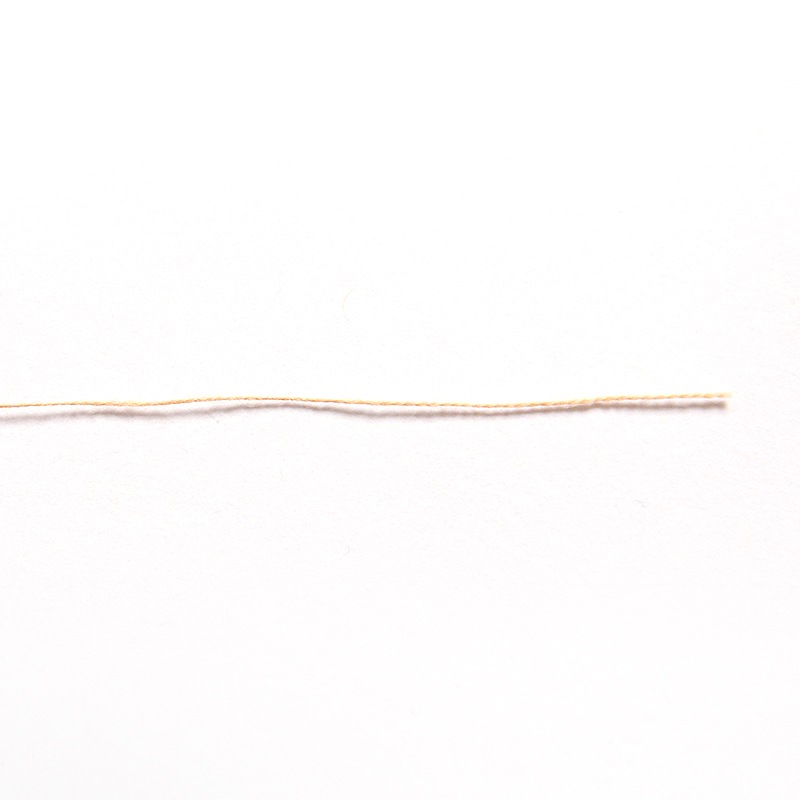 和木綿の糸「薄だいだい」の写真