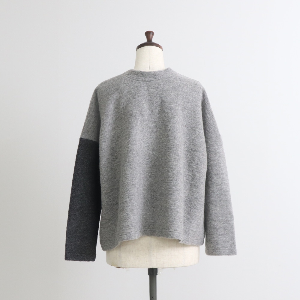 トラベルウールプレミア バイカラーカーディガン カーディガンの正面ディティール