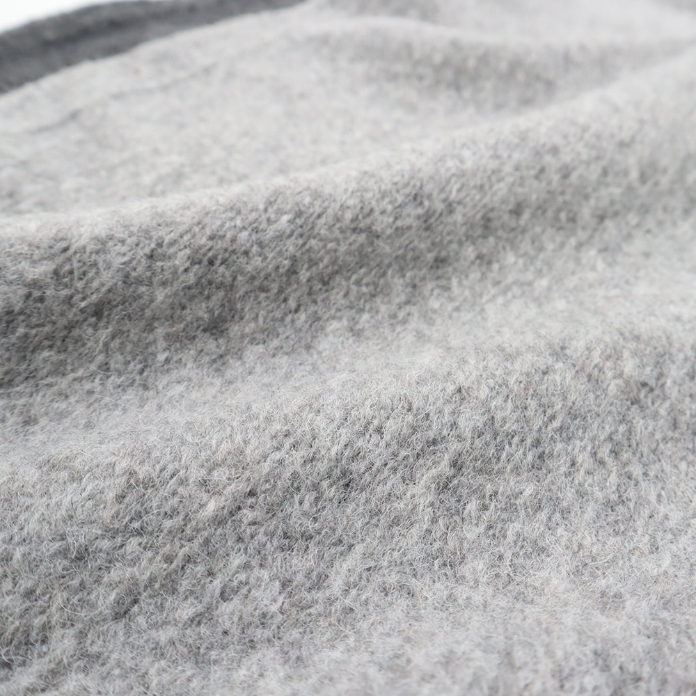 トラベルウールプレミア バイカラーベスト　ベストの素材のアップ