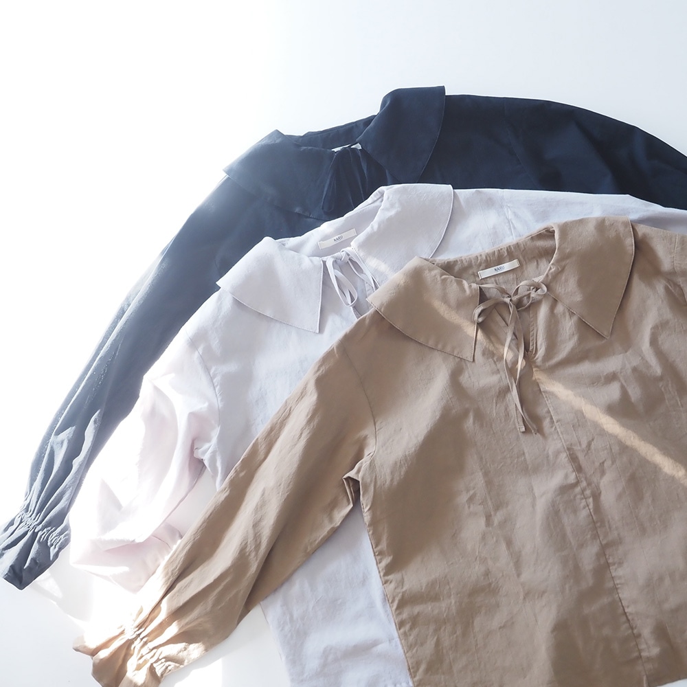 ふんわりローン スキッパーリボンブラウス ブラウスを着た女性の正面