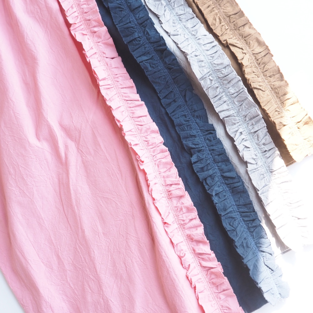 シーチングハンドワッシャー フリンジパンツ パンツを着た女性の正面