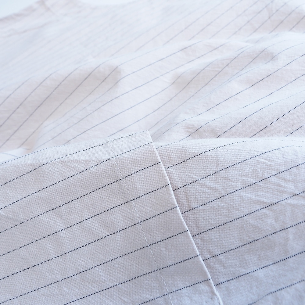 コットンクロスストライプワッシャー ラウンドベスト　ベストの素材のアップ