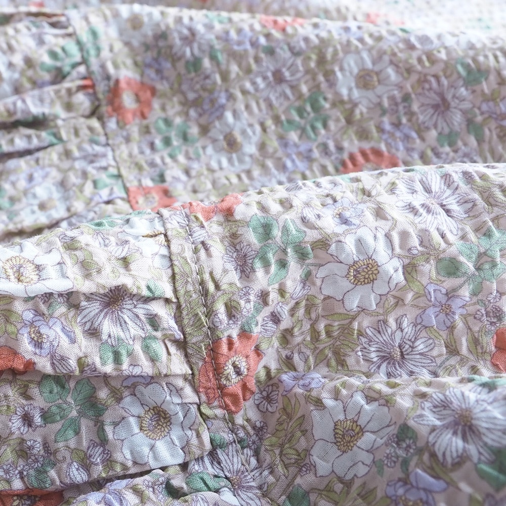 80ローン塩縮ボタニカルフラワー ギャザーチュニック　チュニックの素材のアップ