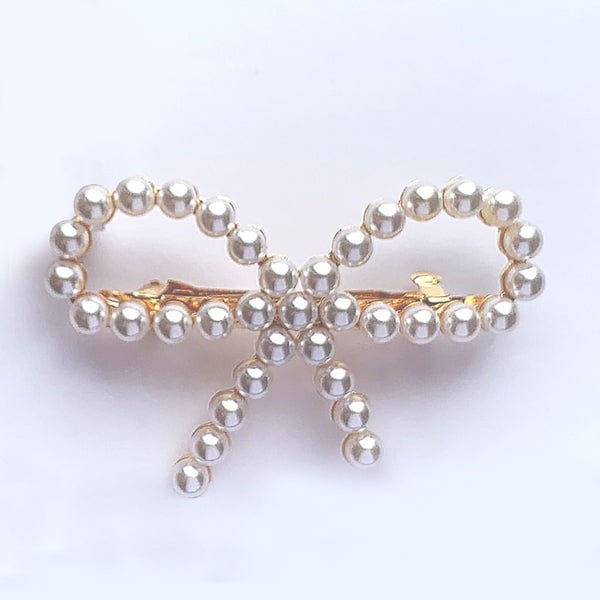 BOW SHAPED PEARL CLIP - ܥ󷿥ѡ롦Хå